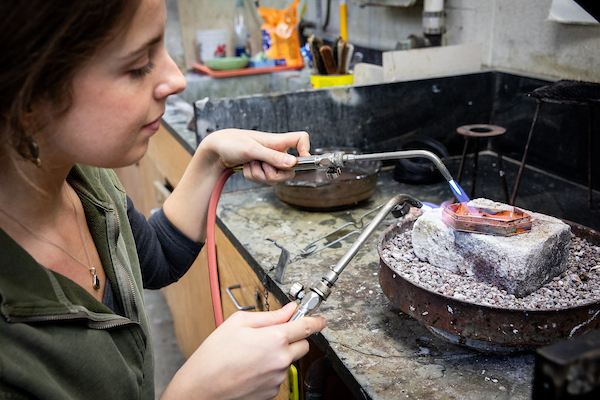 Student forging a ring