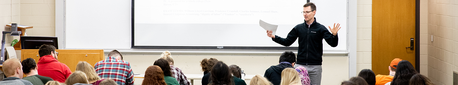 Adam Nelson teaching a course in Educational Policy Studies