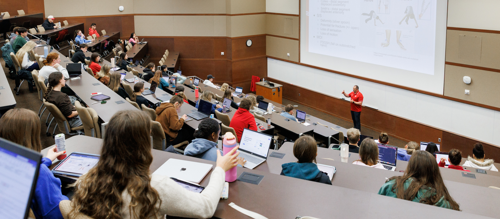 a teacher teaching a college course
